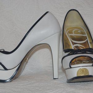 White with black accents platform pumps